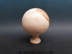 A hardstone ball (diameter 14cm) on stand