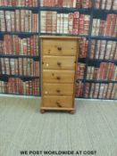 A pine chest of five drawers (W46 D39 H97cm)