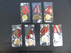 A quantity of Russian commemorative Victory medals including 1918-1978, 1918-1988, 1945-1965,