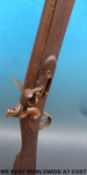 Brown Bess flintlock hammer action rifle with brass butt plate, trigger guard and mounts,