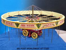 A part complete approximately 1/12 scale set of steam fairground gallopers comprising centre truck,