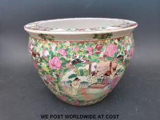 A large oriental polychrome fish bowl,