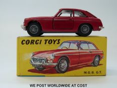 Corgi Toys diecast model MGB GT, 327, with dark red body, pale blue interior,