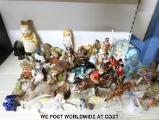 A large collection of ceramics to include Hummel Barnyard Hero, Crown Devon egg rack, Beswick foals,