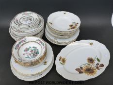 A collection of Indian tree plates and bowls,