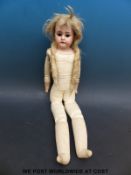 Armand Marseille bisque headed doll with weighted brown eyes, open mouth, long blonde plaited hair,
