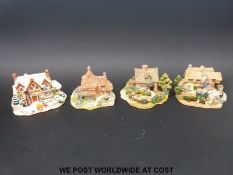 Two large blue and two large green boxed Lilliput Lane houses to include Gertrude's Garden,