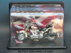 Franklin Mint diecast model Harley Davidson Heritage Softail motorbike in clear display case