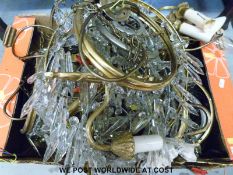 A quantity of cut glass style chandeliers / light fittings