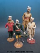 Five various Afghan soldier figures with painted plaster heads and limbs,