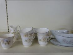 A quantity of Royal Doulton tea and dinnerware in 'Yorkshire Rose' pattern and other similar