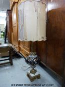 A large 19thC style brass and ceramic lamp (Height 110cm)