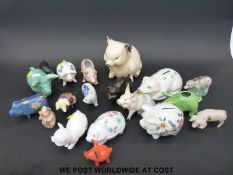 A collection of ceramic pigs to include Sylvac, Beswick Goebel, Belleek, Royal Dux, etc.