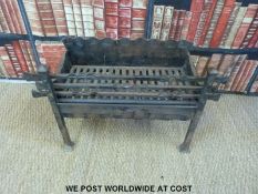 A bespoke fire grate by Michael Roberts of Miserden (W74cm)