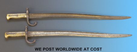 A pair of French model 1866 Chassepot bayonets with 57cm fullered blades,