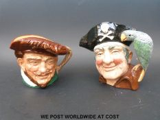Two large Royal Doulton character jugs Long John Silver D6335 (18.5cm tall) and Drake D6115 (15.