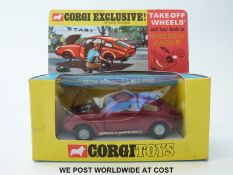Corgi Toys diecast model Mini Marcos GT 850, 341, with metallic maroon body, cream interior,