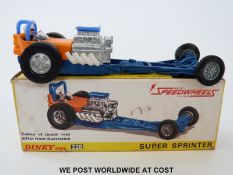 Dinky Toys diecast model Super Sprinter, 228, with orange body and blue chassis, in original box.