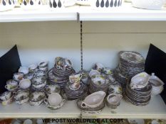 A large quantity of Johnson Brothers dinnerware 'The Friendly Village' and a similar Royal