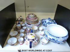 A collection of oriental style china to include plates, cups and saucers,