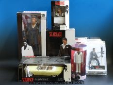 Eight Scarface figures and figure groups including Jada diecast model 1963 Cadillac,