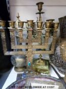 A quantity of largely Middle Eastern/Islamic style brassware,