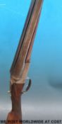 Westley & Richards 12 bore side by side double barrelled shotgun with chequered grip,