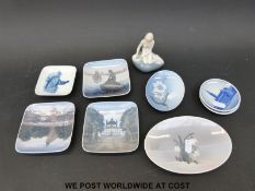 A small collection of Copenhagen and Royal Copenhagen pin dishes and a small figure of the Little