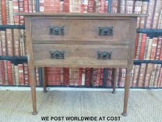 An Art Nouveau side table with two drawers,