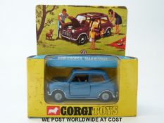 Corgi Toys diecast model Mini Cooper Magnifique, 334, with metallic dark blue body, cream interior,