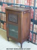 A mahogany music cabinet (W55 D40 H95cm) and an oak dressing table