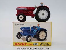 Dinky Toys diecast model Leyland 384 Tractor, 308, with metalic red body, white hubs and driver,