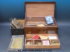 A fitted wooden box containing Meccano and a very early Meccano motor in original box