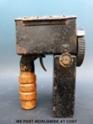 An Admiralty pattern 1038 signalling lantern with trigger mechanism and five various lenses