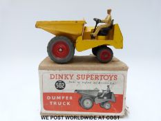 Dinky Supertoys diecast model Dumper Truck, 562, with yellow body and red wheels,