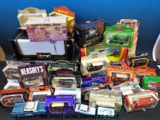 A collection of Burago, Matchbox and other diecast model vehicles,