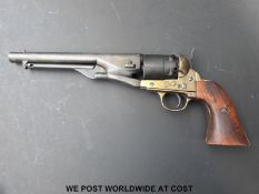 A replica BKA six-shot revolver with brass shaped wooden grips and 20cm barrel,