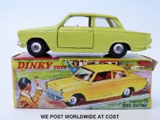 Dinky Toys diecast model Ford Cortina, 133, with pale lime body, red interior and spun hubs,