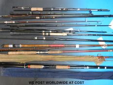 A large collection of modern fishing rods including an Edgar Sealey 'Featherweight' example
