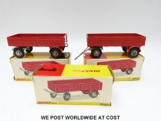 Three Dinky Toys diecast model Large Trailers with hooks , 428, with red bodies, grey chassis,