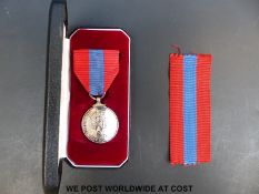 A cased Elizabeth II Imperial Service medal marked Miss Joyce Beatrice Foreman (of RAF Quedgeley