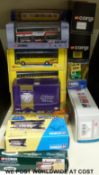 Seventeen Corgi diecast model buses, coaches and trams,
