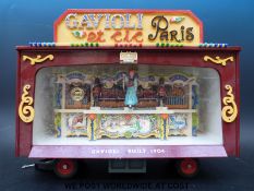 A quantity of approximately 1/12 scale fairground models to include boxing booth, Showman's engine,