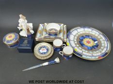 A collection of Royal Worcester Millennium items including ring box, letter knife, candle snuffer,