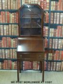 A mahogany Art Deco style bureau bookcase with Podger & Davis Ltd Weston Super Mare plaque to