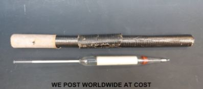 A GF-363 WW2 German Kriegsmarine U-boat hydrometer in its storage tube