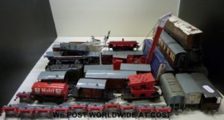Thirty Hornby Dublo 00 gauge carriages and wagons together with various accessories including