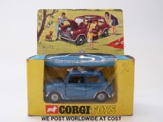 Corgi Toys diecast model Mini Cooper Magnifique, 334, with metallic dark blue body, cream interior,