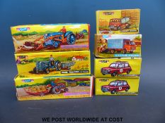Seven Telsalda scale model friction toys, comprising Farm Tractor with Trailer, Shovel Tractor,