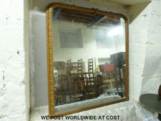 A large gilt framed over mantel mirror (135cm x 127cm overall)